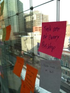 Students' observations about trash and litter in Philadelphia were handwritten on colorful sticky notes and posted on the windows of the rooftop Hamilton Garden at the Kimmel Center for the Performing Arts.