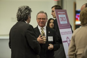 Fox School of Business Dean M. Moshe Porat speaks with Istvan Varkonyi, Director of Temple University's General Education Program, Office of the Senior Vice Provost, at the 2014 Innovative Idea Competition.