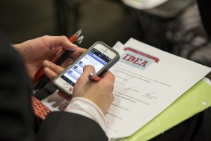 An attendee of the Innovative Idea Competition uses Yorn.com to cast a vote for the People’s Choice Awards. For the first time in the competition’s 17-year history, attendees were offered an opportunity to provide feedback on presentations using real-time voting technology.