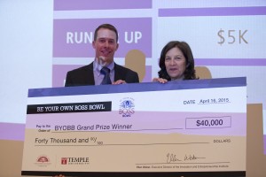 Innovation and Entrepreneurship Institute executive director Ellen Weber presenting Ben Stucker with the check. Photos by Temple University Photography.