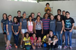Members of Fox School student Brandon Study’s non-profit, Into The Nations, pose for a photo with El Salvadorans on a recent visit. (Courtesy Brandon Study)