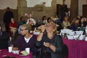 Attendees of the League for Entrepreneurial Women’s Conference blow bubbles at the urging of Lu Ann Cahn, Director for Career Services at Temple University’s School of Media and Communication. (Photography by Jim Roese)