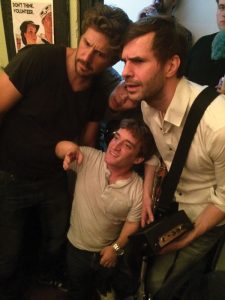 Nic Novicki meets with comedians Brian Swinehart (left) and Terence Leclere (right) before Novicki’s comedy set at the Upright Citizens Brigade Theater in Los Angeles.