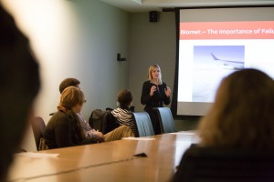 Fox School of Business undergraduate Rebecca Uhl delivers a presentation to Temple University medical students at Alter Hall.