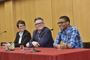 Titus Knox, president of the Temple University Queer Student Union, far right, speaks during the Fox School’s “Bridging the Gap: LGBTQIA in Business” event. Knox was joined in a panel discussion by Helen Fitzpatrick, far left, director of the City of Philadelphia’s LGBT Affairs Office, and Matthew Ray, center, co-founder and creative director of ChatterBlast Media. (Jim Roese Photography)