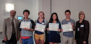Dr. Sanat Sarkar, left, Chair of the Department of Statistics, and Dr. Alexandra Carides, right, Assistant Professor of Statistics, bookend the students from Methacton High School who won the Fox School of Business Statistics Data Challenge.