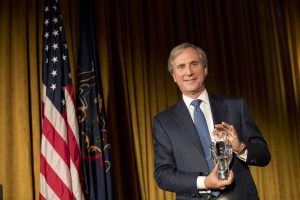 Gerard H. “Jerry” Sweeney, of Brandywine Realty Trust, holds his crystal owl statuette as the recipient of the 2016 Musser Award for Excellence in Leadership.