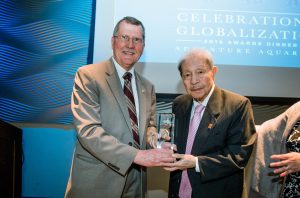Temple University President Dr. Richard Englert honors Dr. Kailin Tuan, Fox School of Business Professor Emeritus, at the university’s 4th biennial Celebration of Globalization. (Photography by Shefa Ahsan)