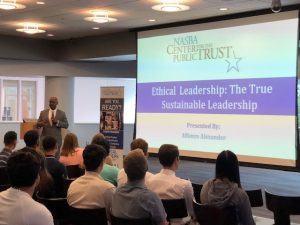 Alfonzo Alexander with project screen reading "Ethical Leadership: The True Sustainable Leadership"