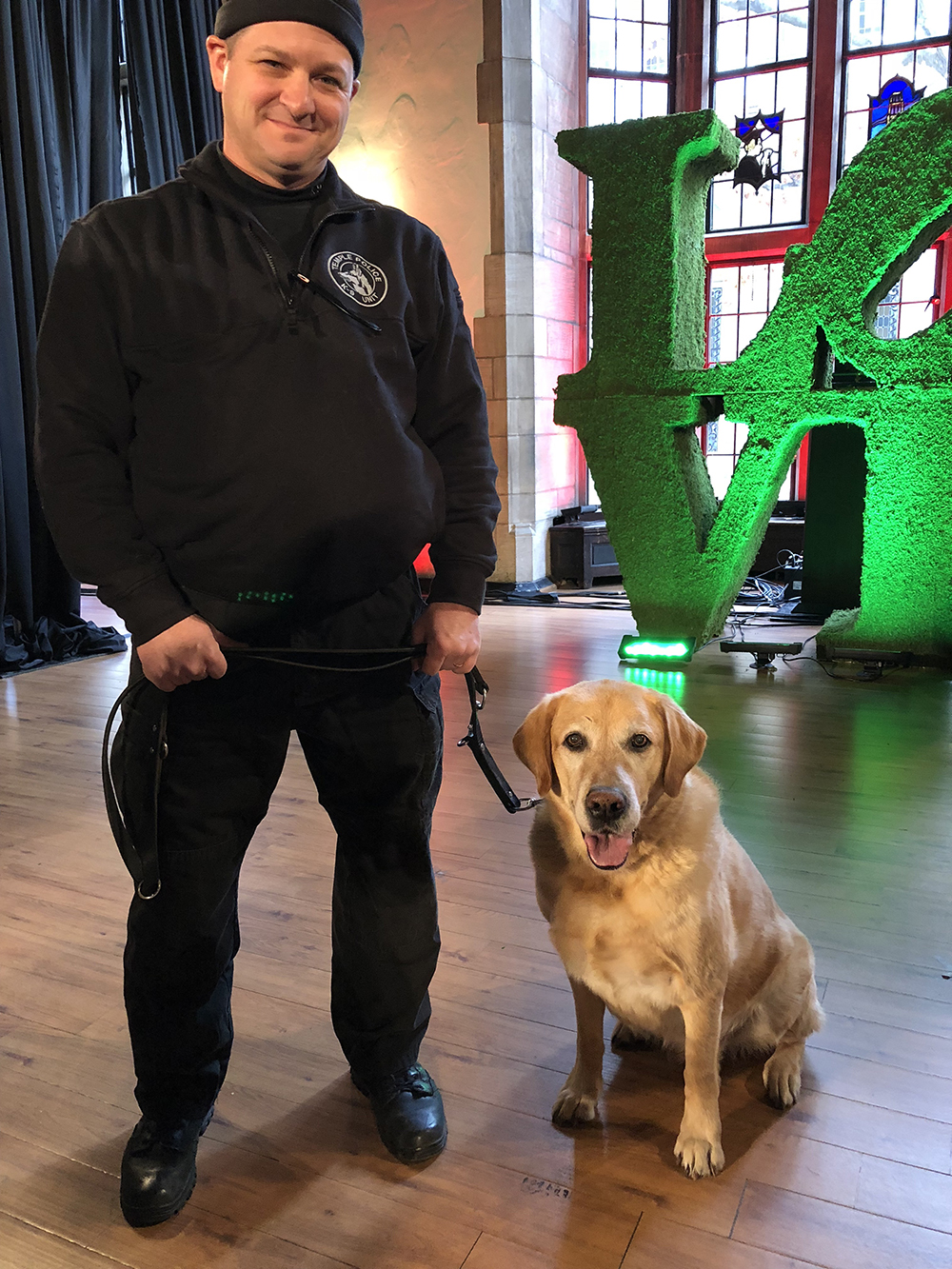 Temple Police Officer Lawrence Besa and his retired canine partner Jarvis prepare to present the 2018 Musser Award.