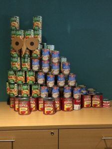 Donated cans in the shape of an owl