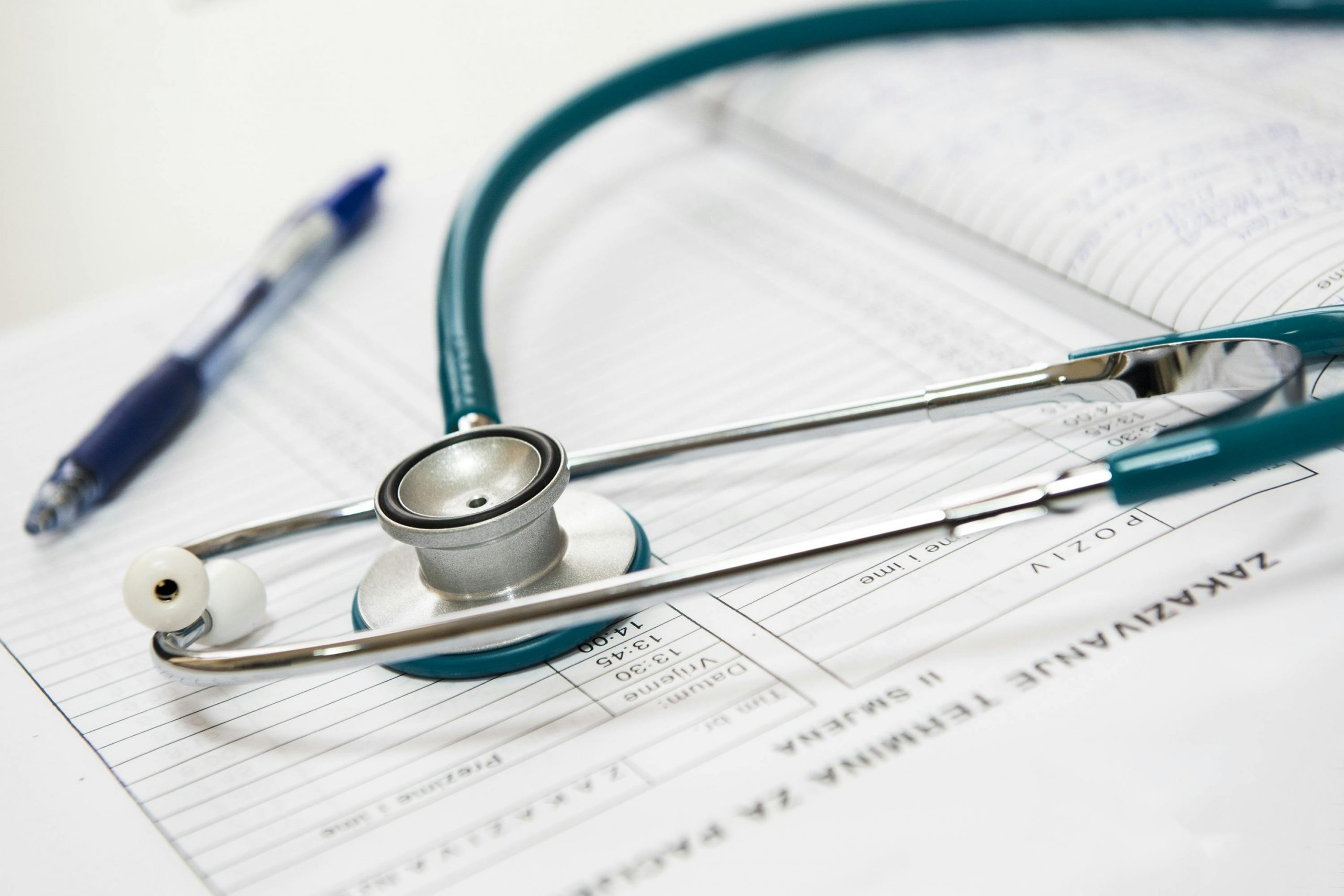 A stethoscope on records. Courtesy of Pexels.