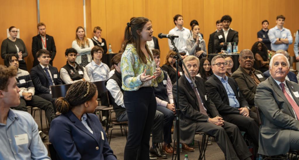 Students ask questions of guest speaker Nauman Shah