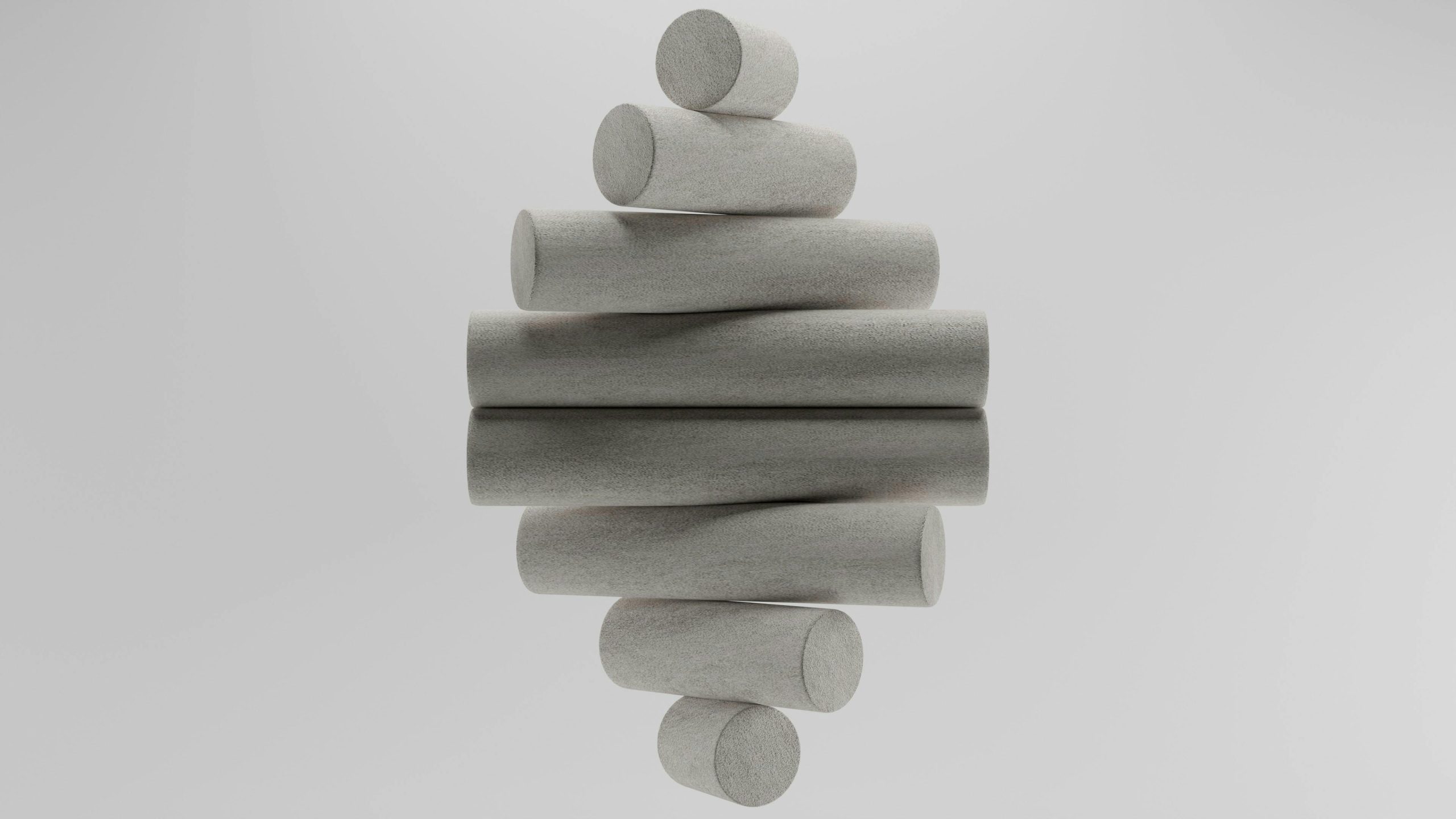 White Wooden dowels stacked to appear as a diamond.